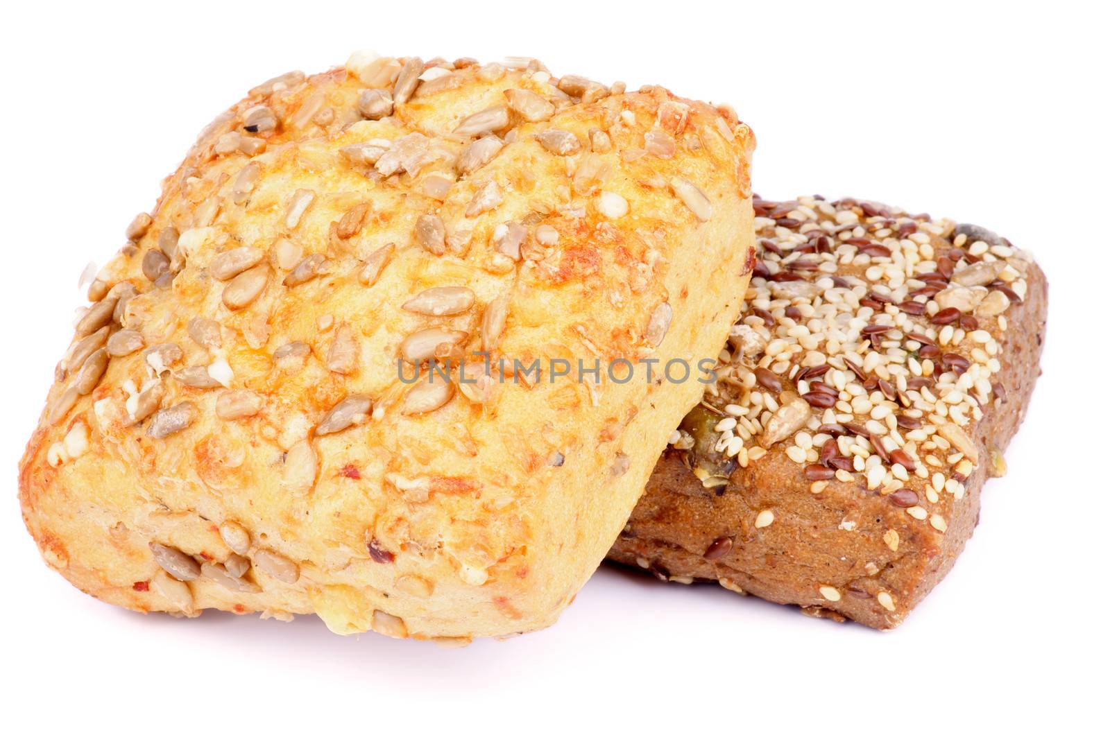 Heap of Sunflower Seeds and Sesame Seeds Buns isolated on white background