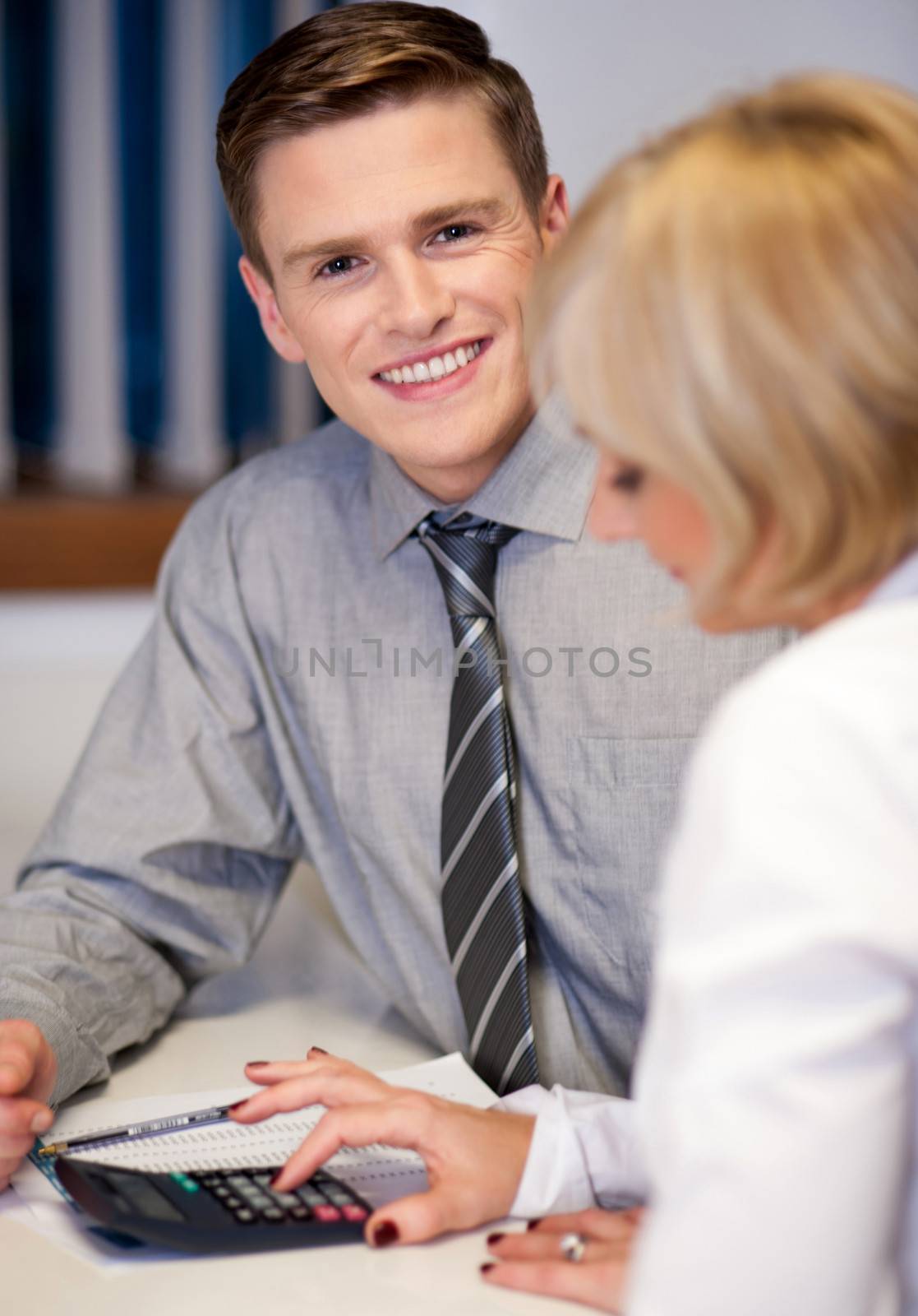 Manager working with his secretary by stockyimages