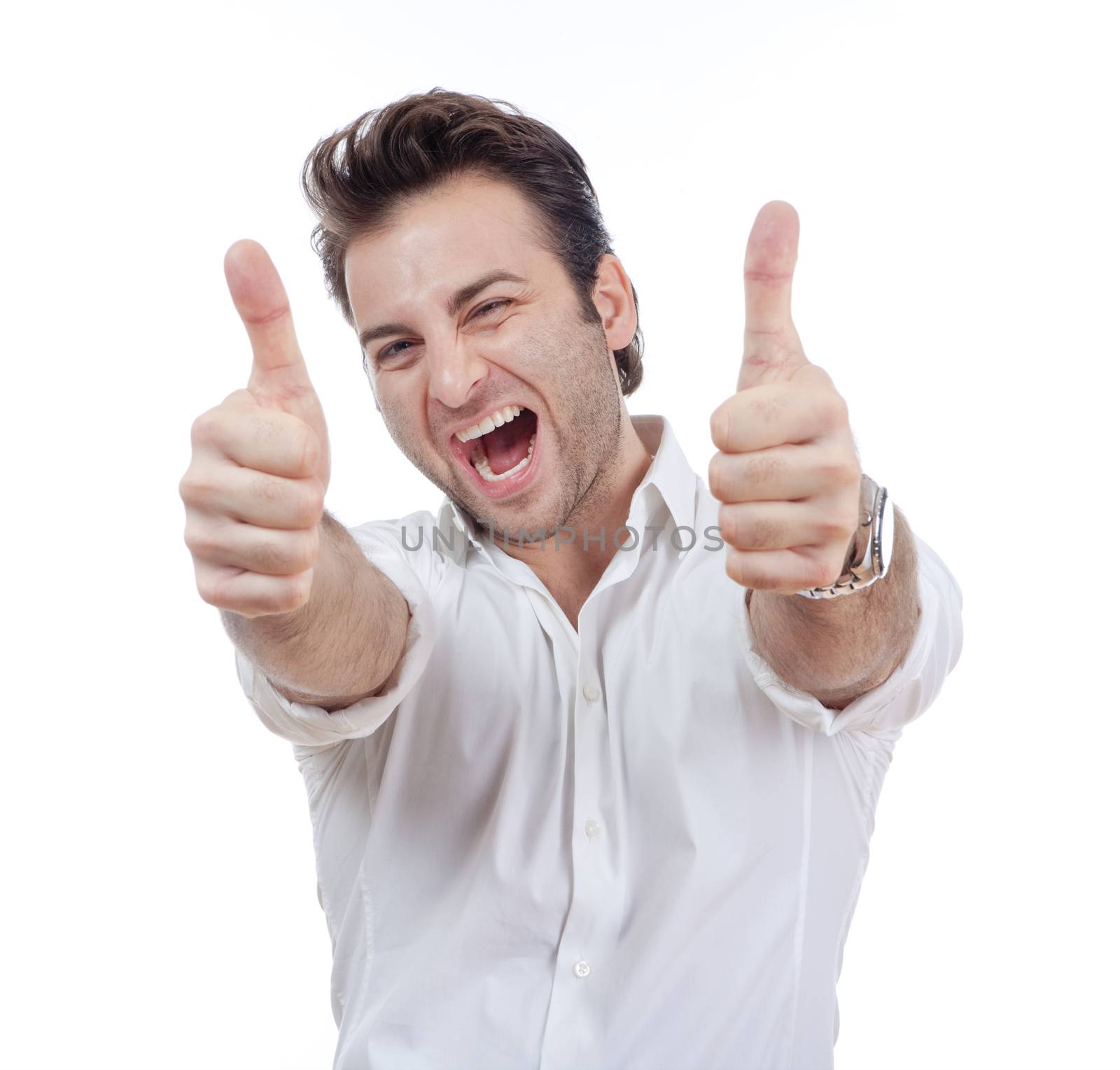excited man laughing holding his both thumbs up - isolated on white