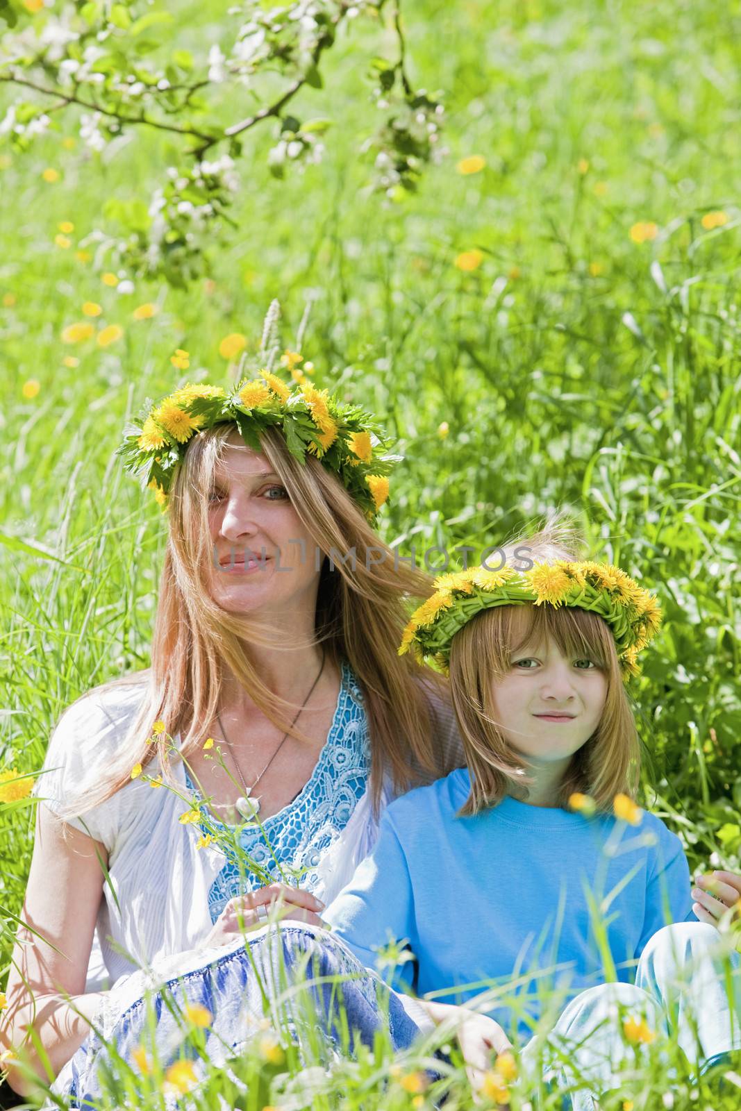 mother and son with flower wreaths by courtyardpix