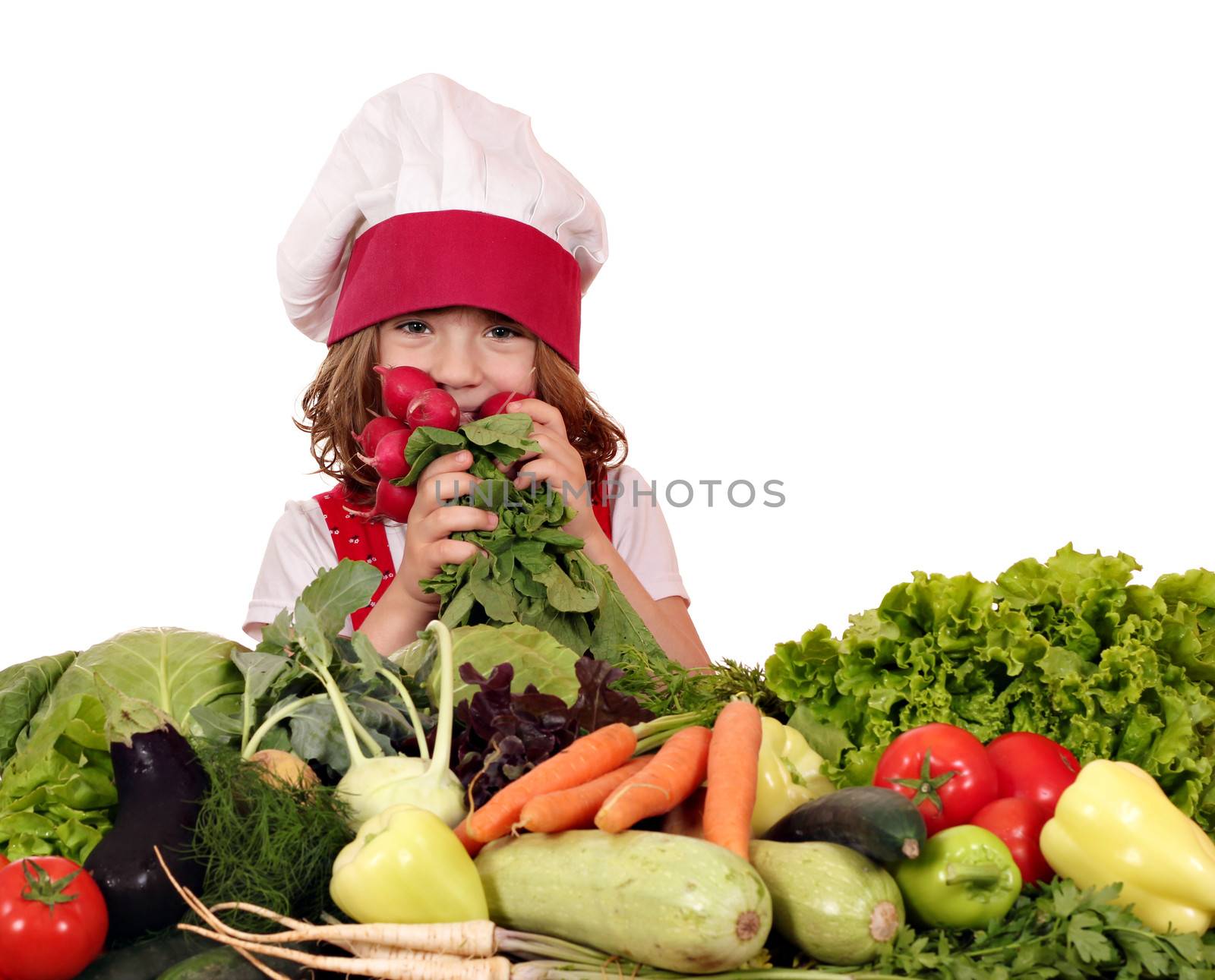 beautiful little girl cook with different vegetables by goce