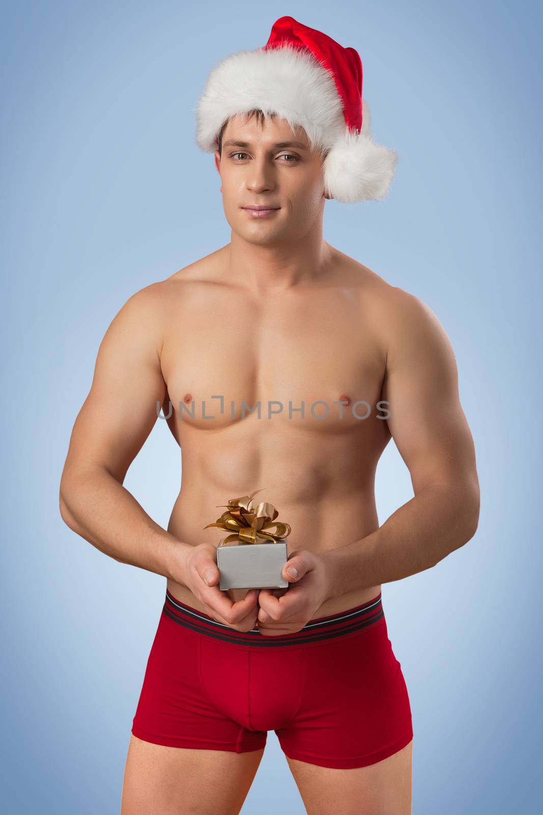 handsome man with santa cap by mihalec