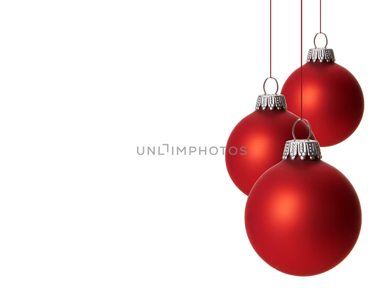 red christmas balls isolated hanging with white background 