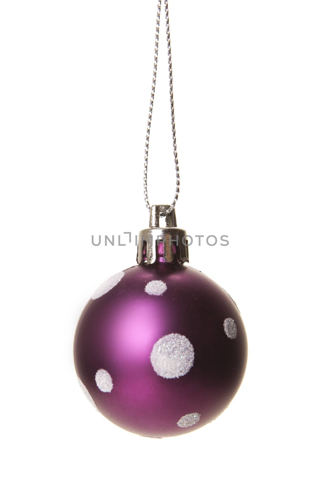 purple christmas ball with white pattern isolated hanging with white background 