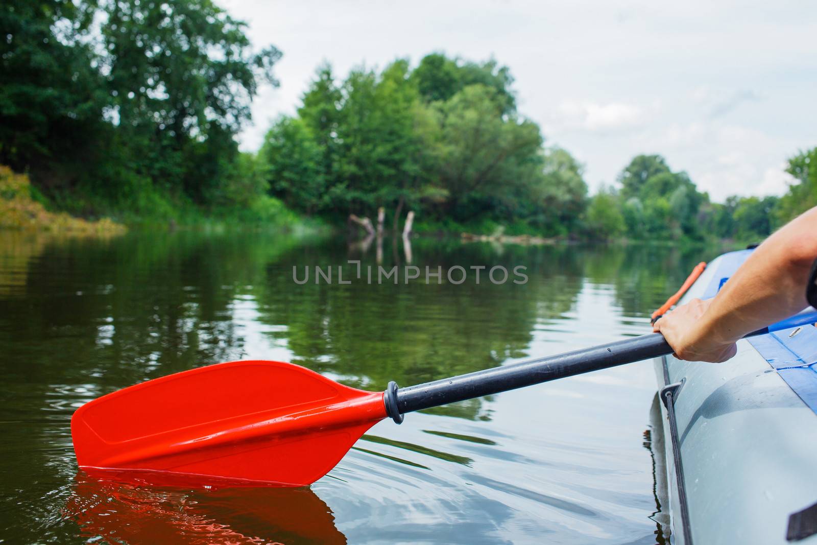 Red paddle for white water rafting and kayaking