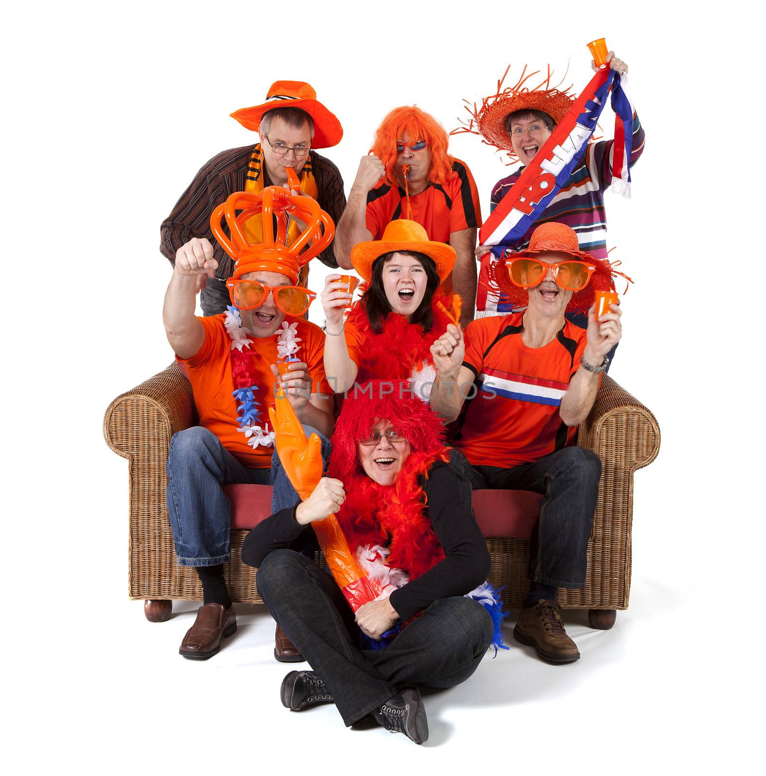 Group of Dutch soccer fan watching game over white background