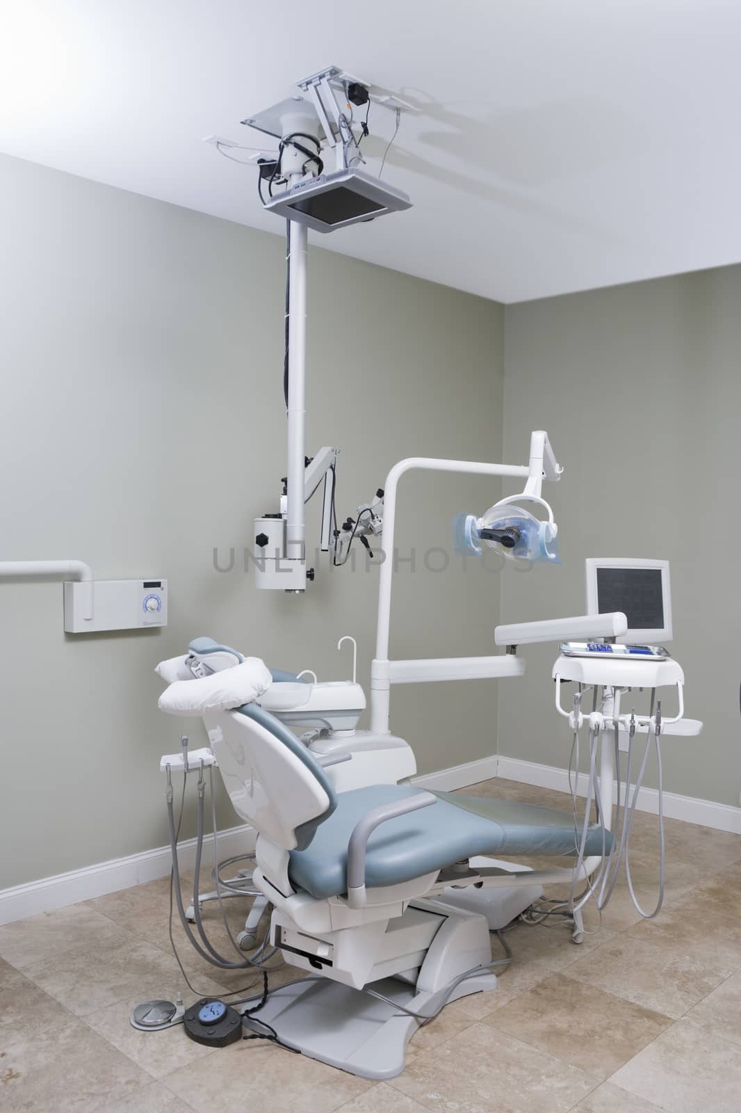 Dentist chair in dentist's office by moodboard