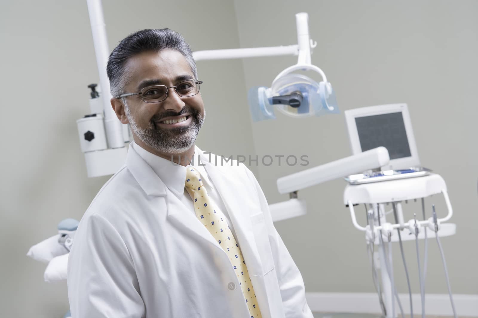 Portrait of dentist by moodboard
