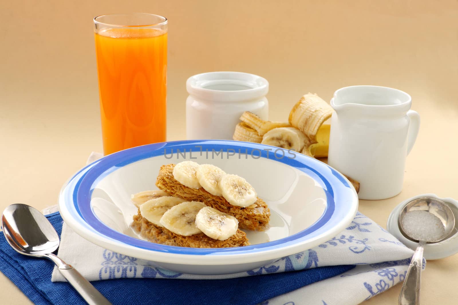 Iconic Australian breakfast cereal Weet Bix served with juice and banana.