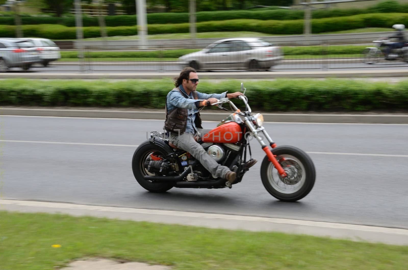 WROCLAW, POLAND - MAY 18: Unidentified motorcyclist rides Harley-Davidson motor during parade Super Rally. Around 8 thousands riders joined this event from 16 to 20 May 2013 in Wroclaw.