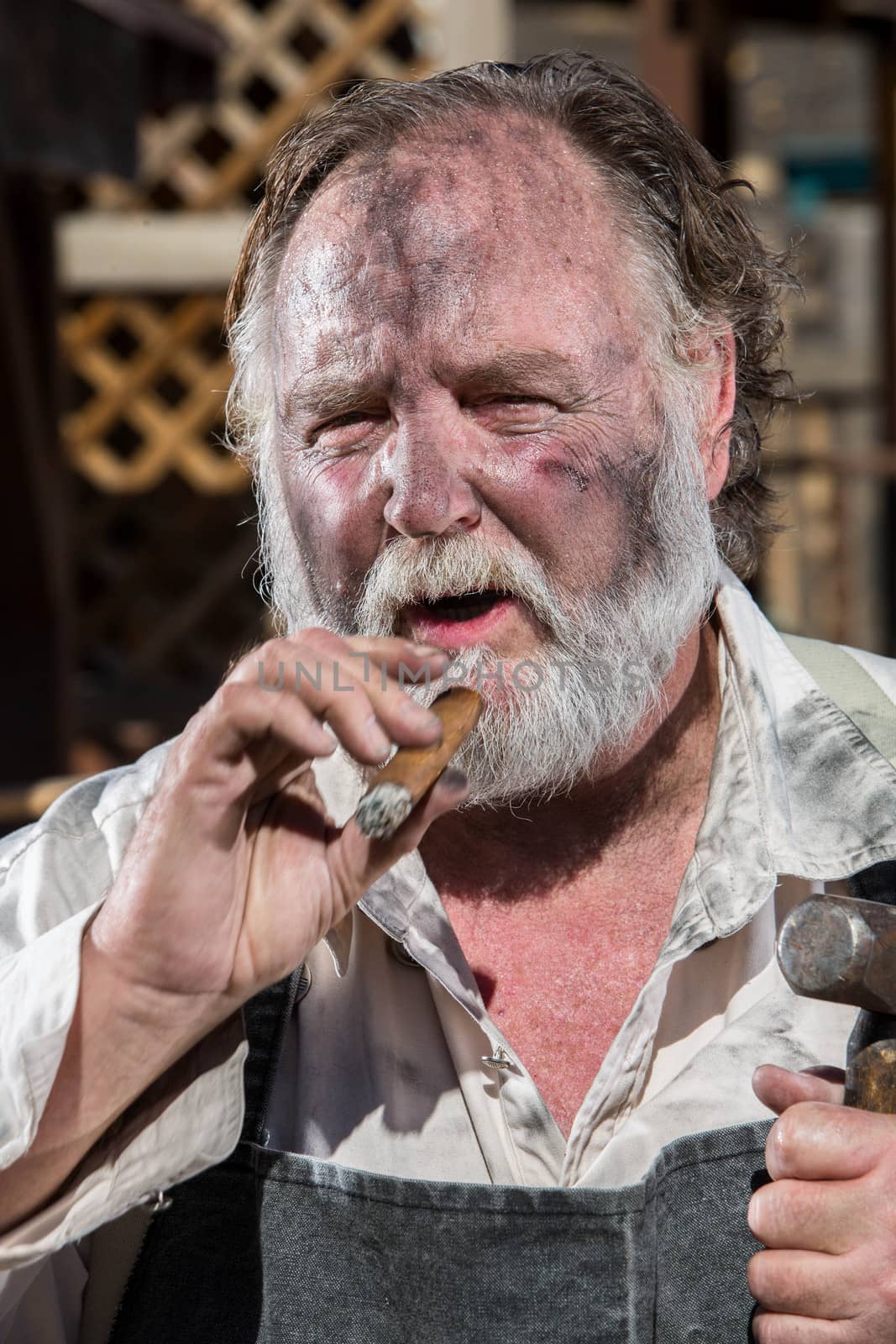 Old West Blacksmith Smokes a Cigar