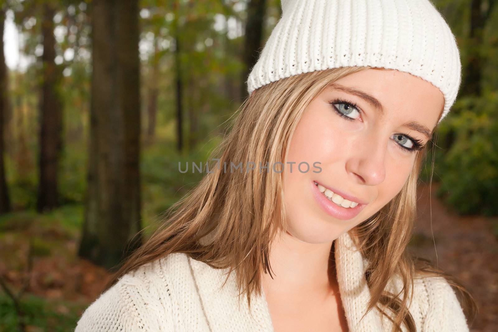 Girl portrait in the forest while its raining