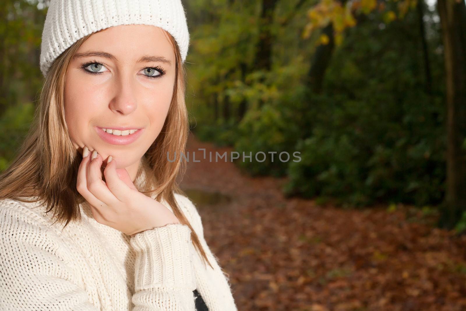 Girl portrait in the forest while its raining