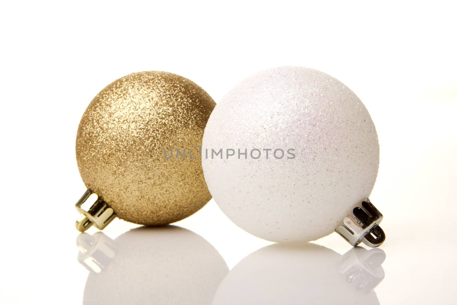 golden and white christmas baubles  isolated 