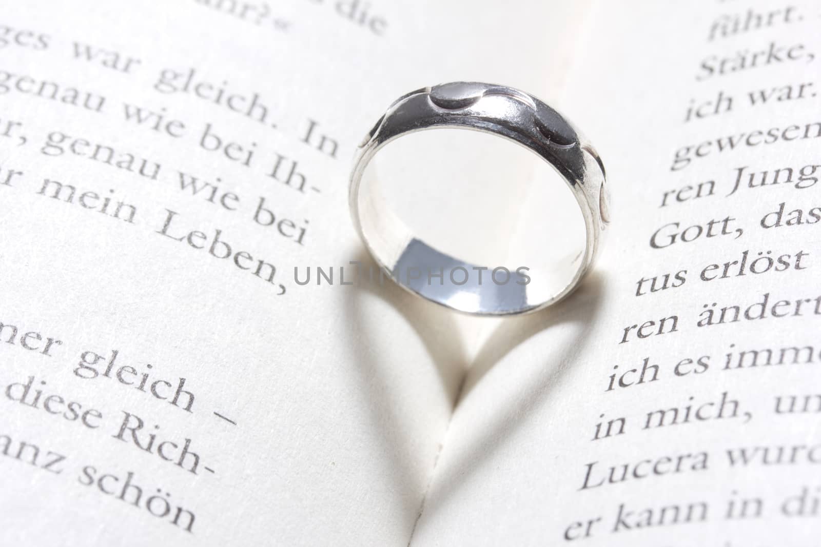 heart in a book by a ring