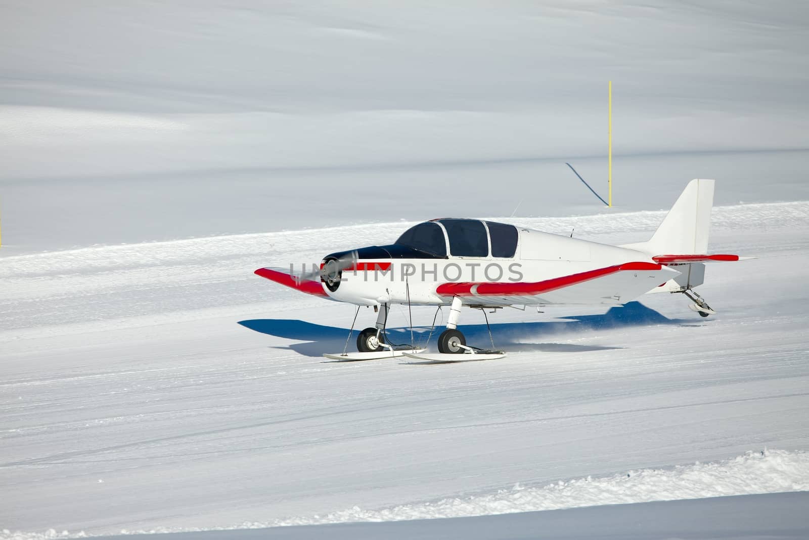 Snowplane landing in the mountains