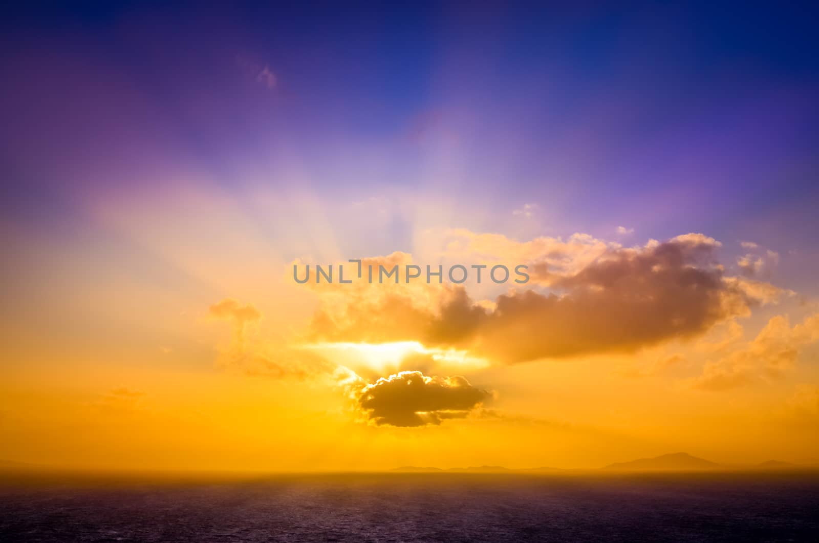 Scenic landscape view of ocean sunset with beautiful colorful sky