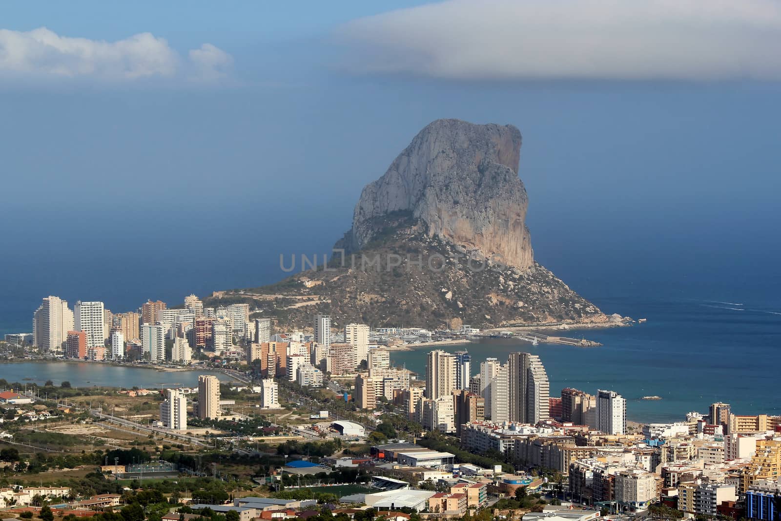 Natural Park of Penon de Ifach situated in Calp, Spain. A massive limestone outcrop emerging from the sea and linked to the shore by rock debris. Is home to numerous rare plants and over 300 species of animals, and nesting site for sea birds and other birds.