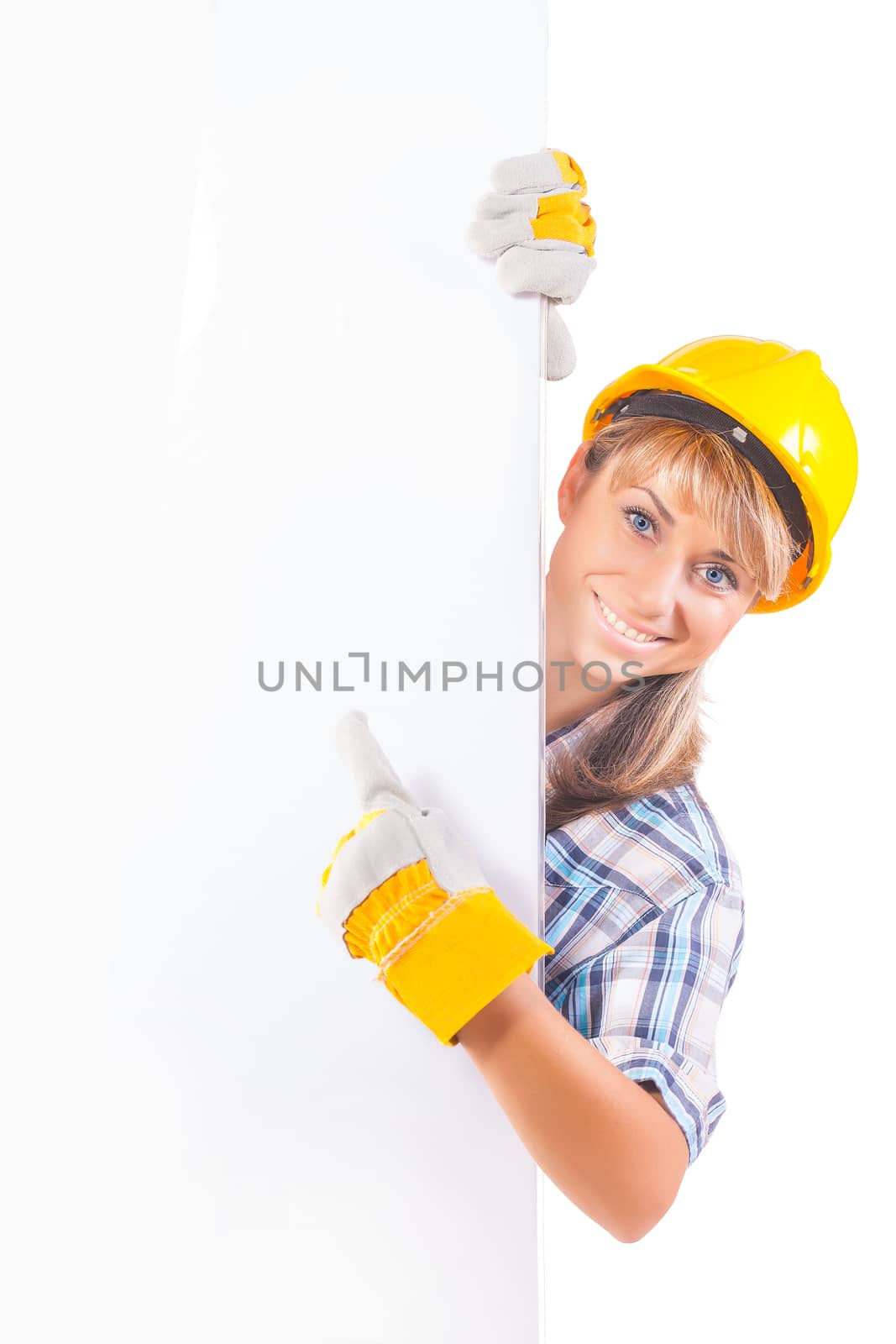 Female construction worker with blank board isolated on white by mihalec