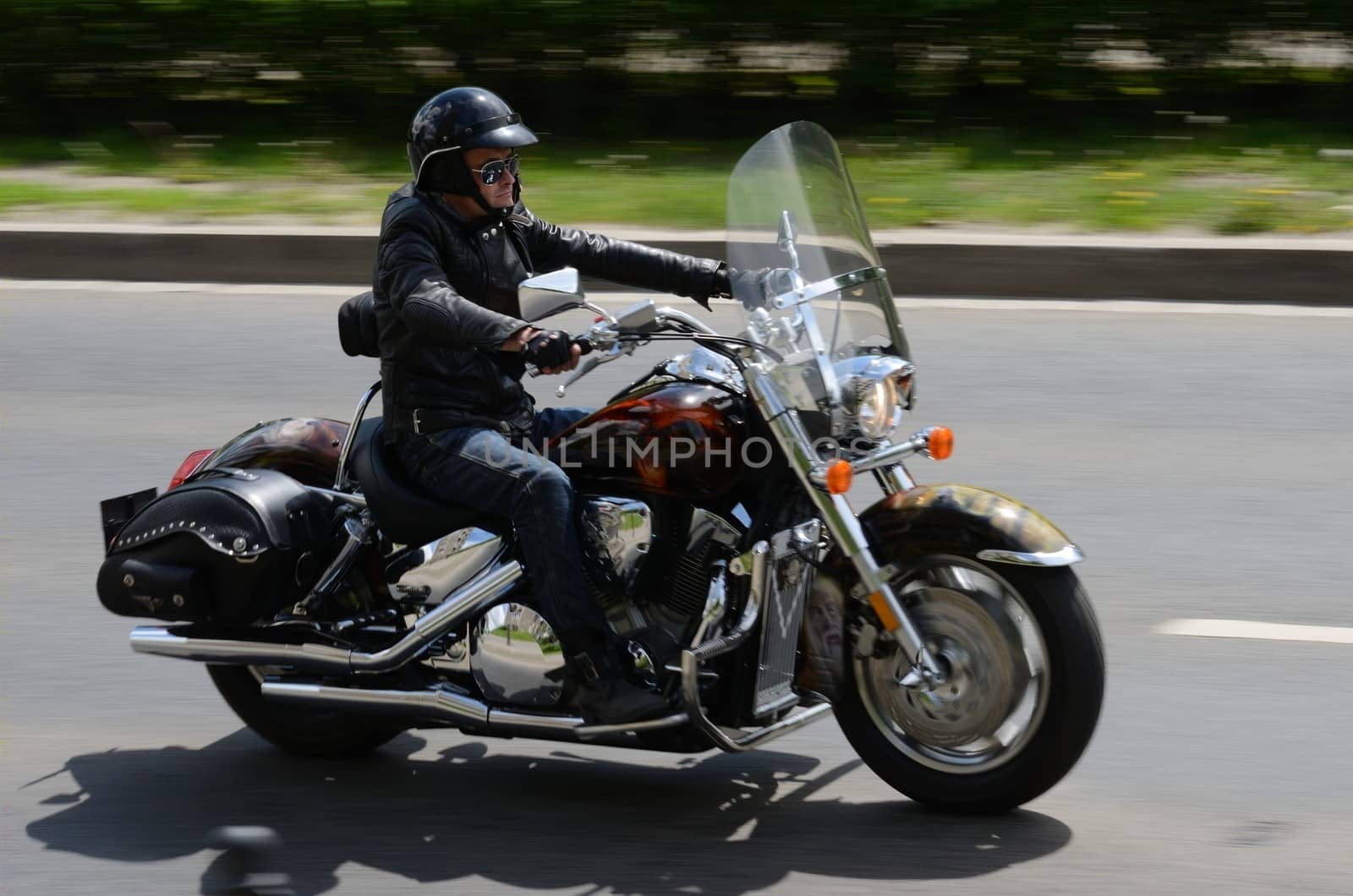 WROCLAW, POLAND - MAY 18: Unidentified motorcyclist rides Harley-Davidson motor during parade Super Rally. Around 8 thousands riders joined this event from 16 to 20 May 2013 in Wroclaw.