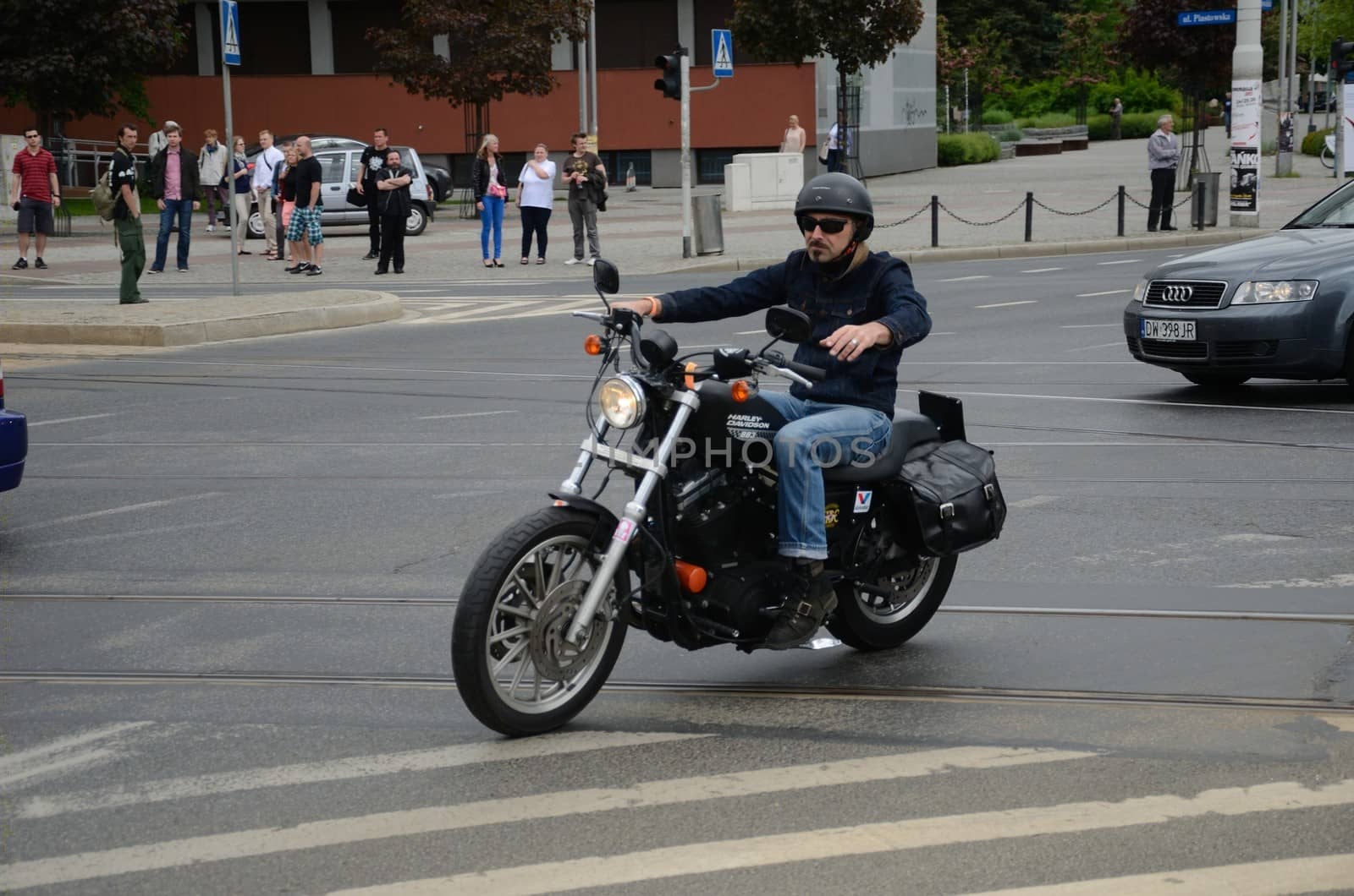 WROCLAW, POLAND - MAY 18: Unidentified motorcyclist rides Harley-Davidson in city center. Around 8 thousands riders joined this event from 16 to 20 May 2013 in Wroclaw.