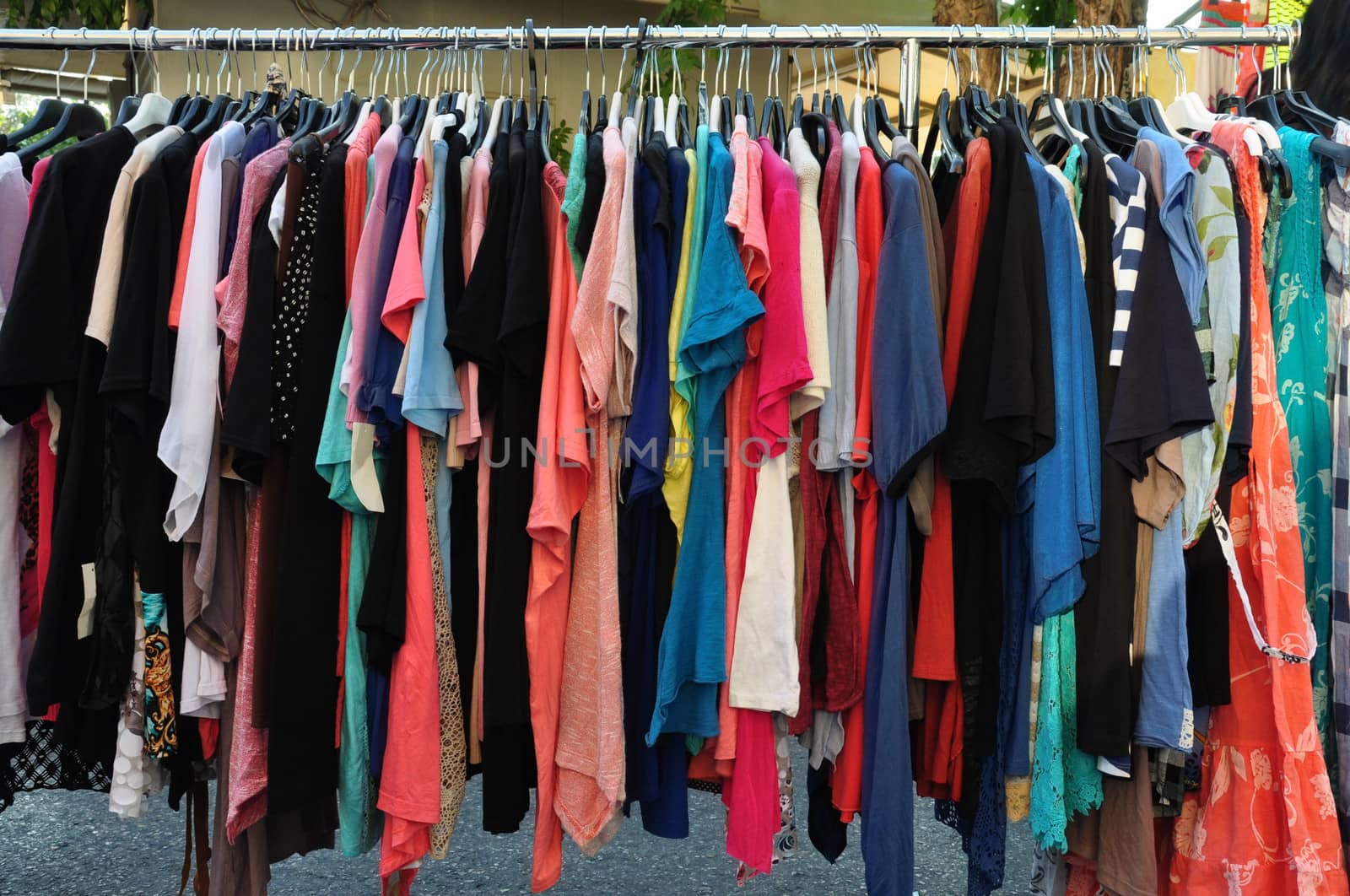 Women's casual summer clothes for sale at street market.