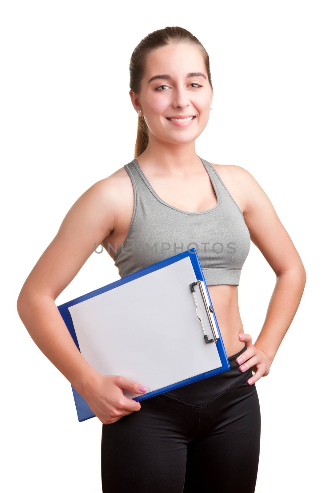 Personal Trainer, with a pad in his hand, isolated in white