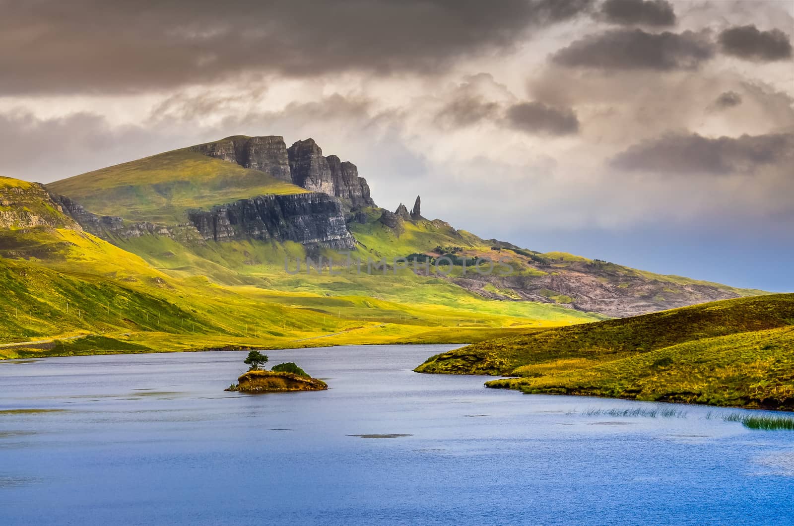 Landscape view of Old Man of Storr rock formation and lake, Scotland, United Kingdom