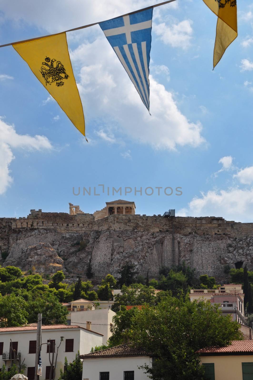 View of Plaka an old historical neighborhood built under the Acropolis rock in Athens, Greece.