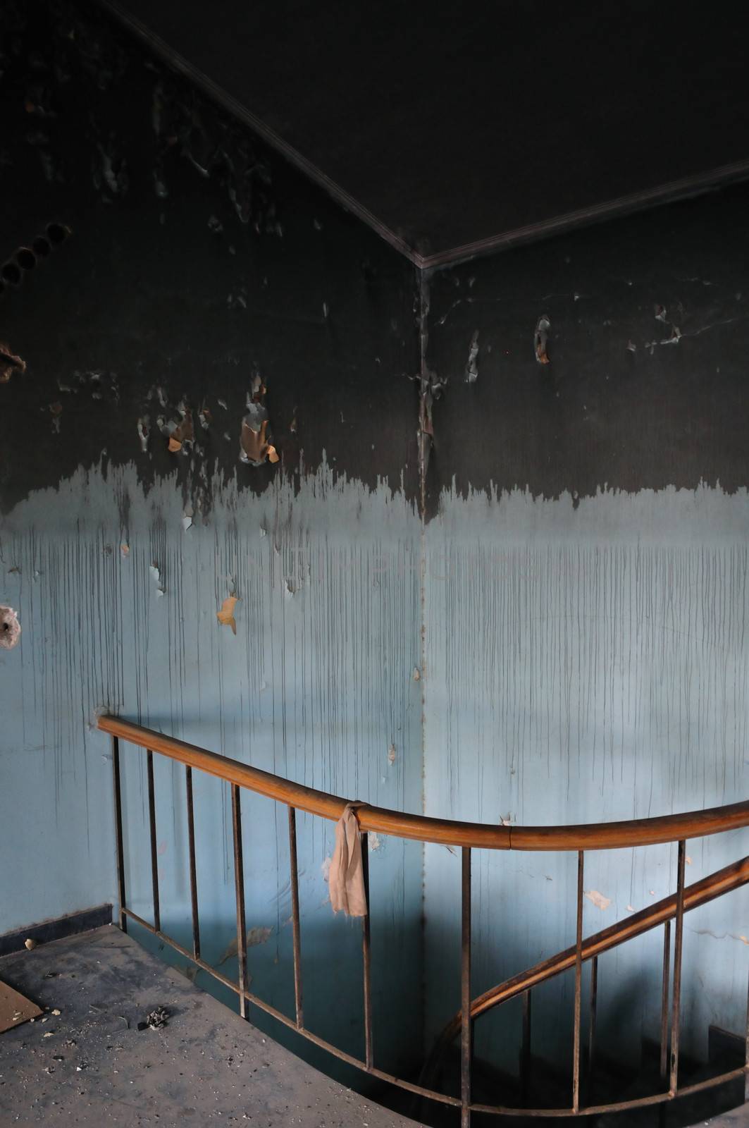 stained wall and staircase in abandoned house by sirylok