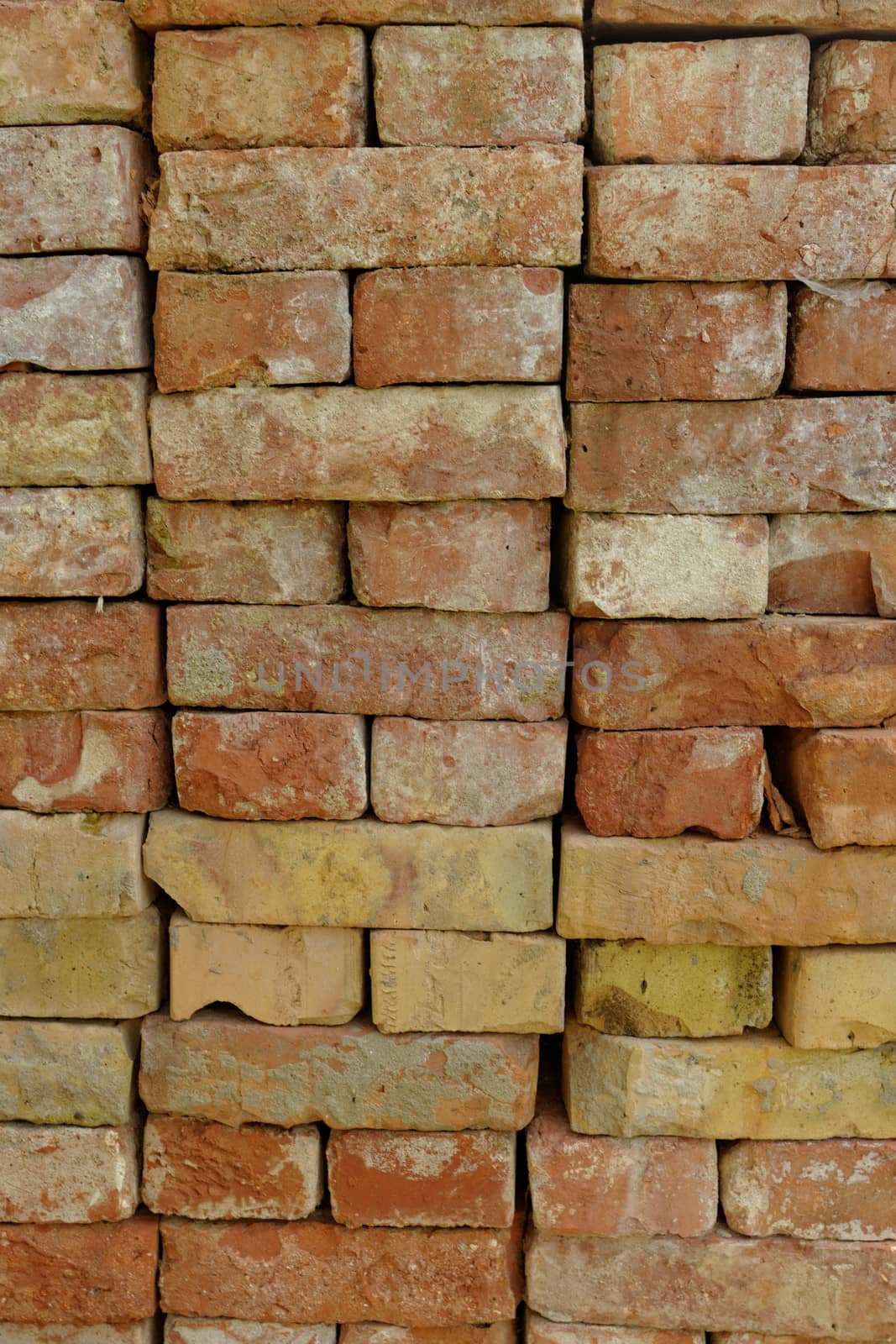 stacked red bricks on each other
