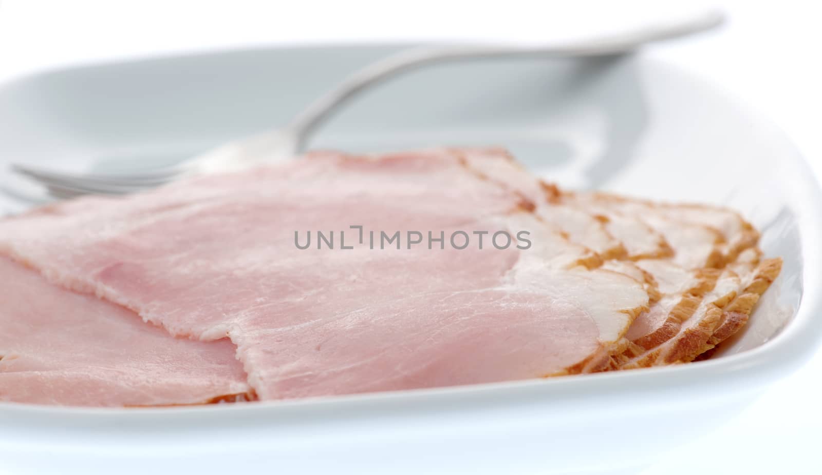 Ham slices on a plate