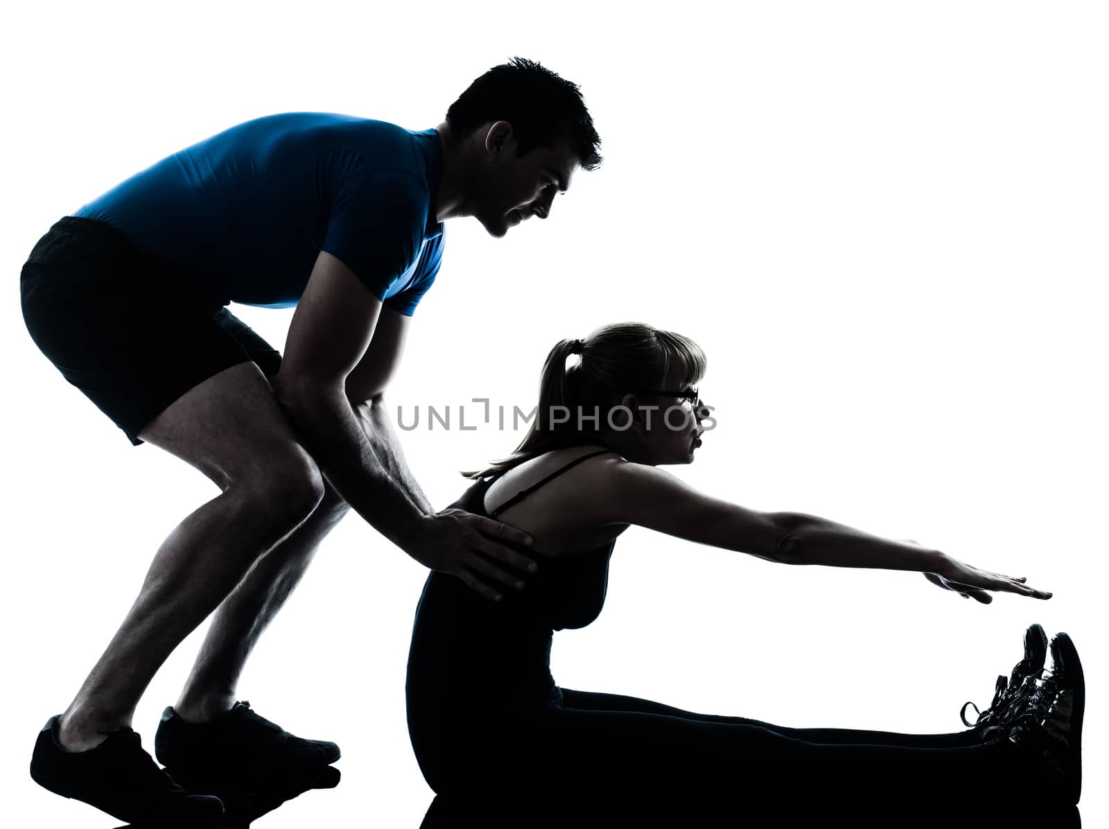 caucasian aerobics instructor with mature woman exercising fitness workout in silhouette studio isolated on white background