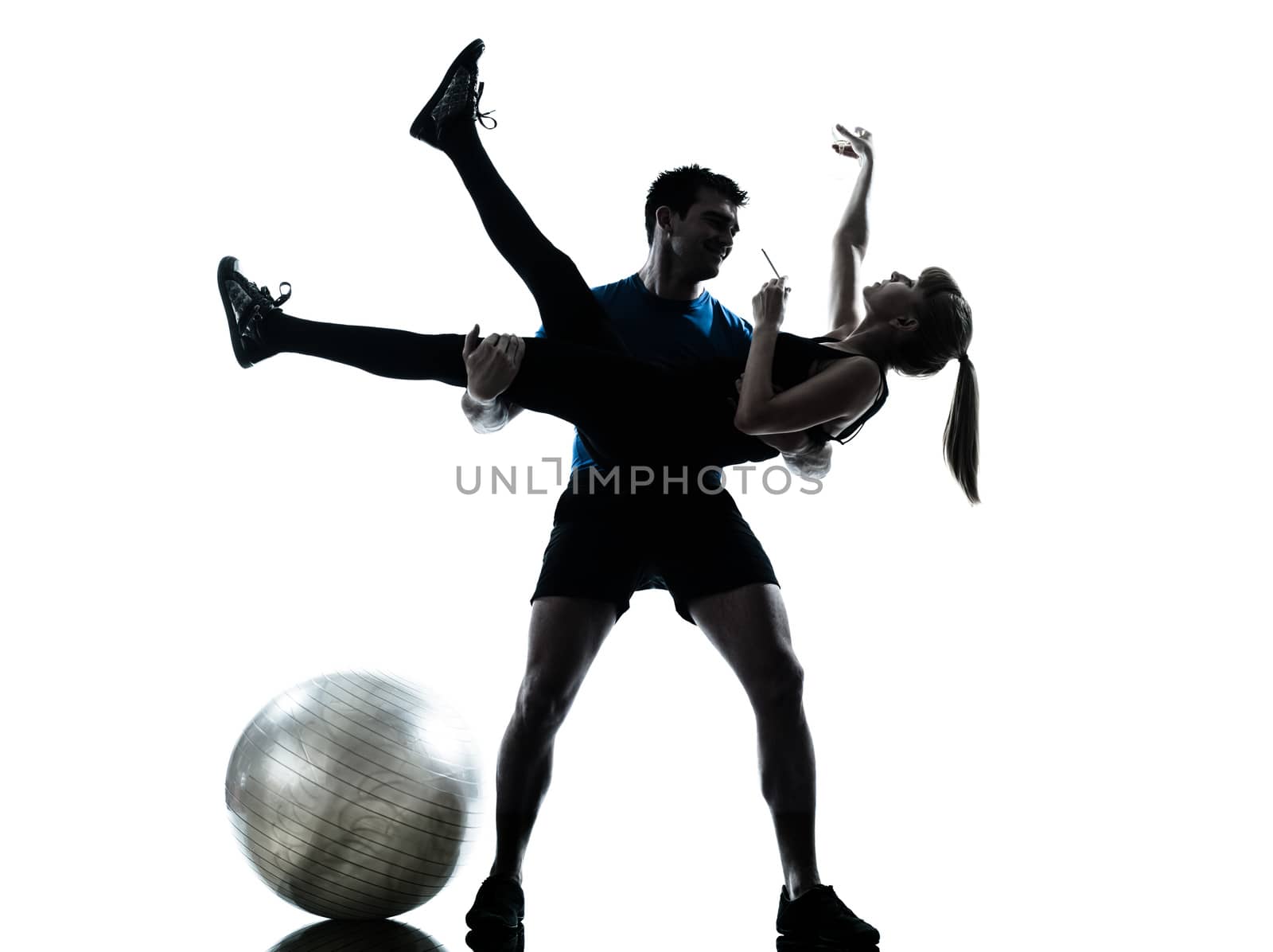 caucasian aerobics instructor with mature woman exercising fitness workout in silhouette studio isolated on white background