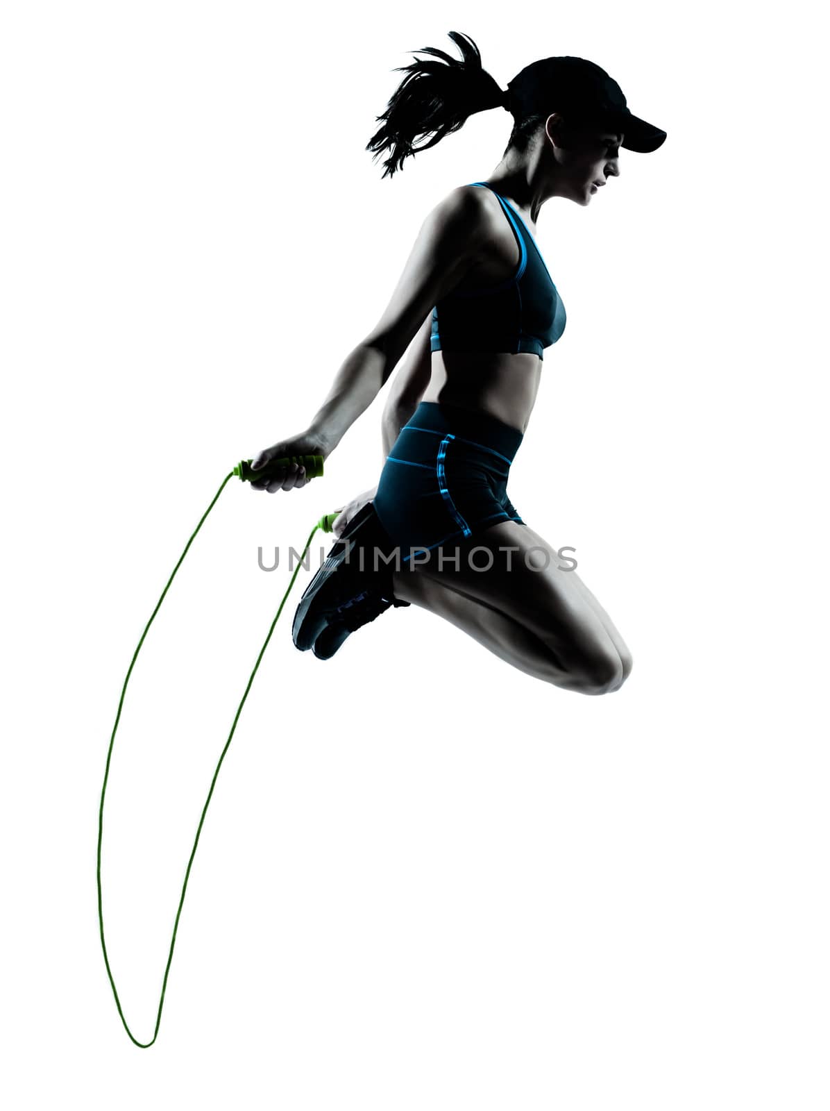one caucasian woman runner jogger jumping rope in silhouette studio isolated on white background