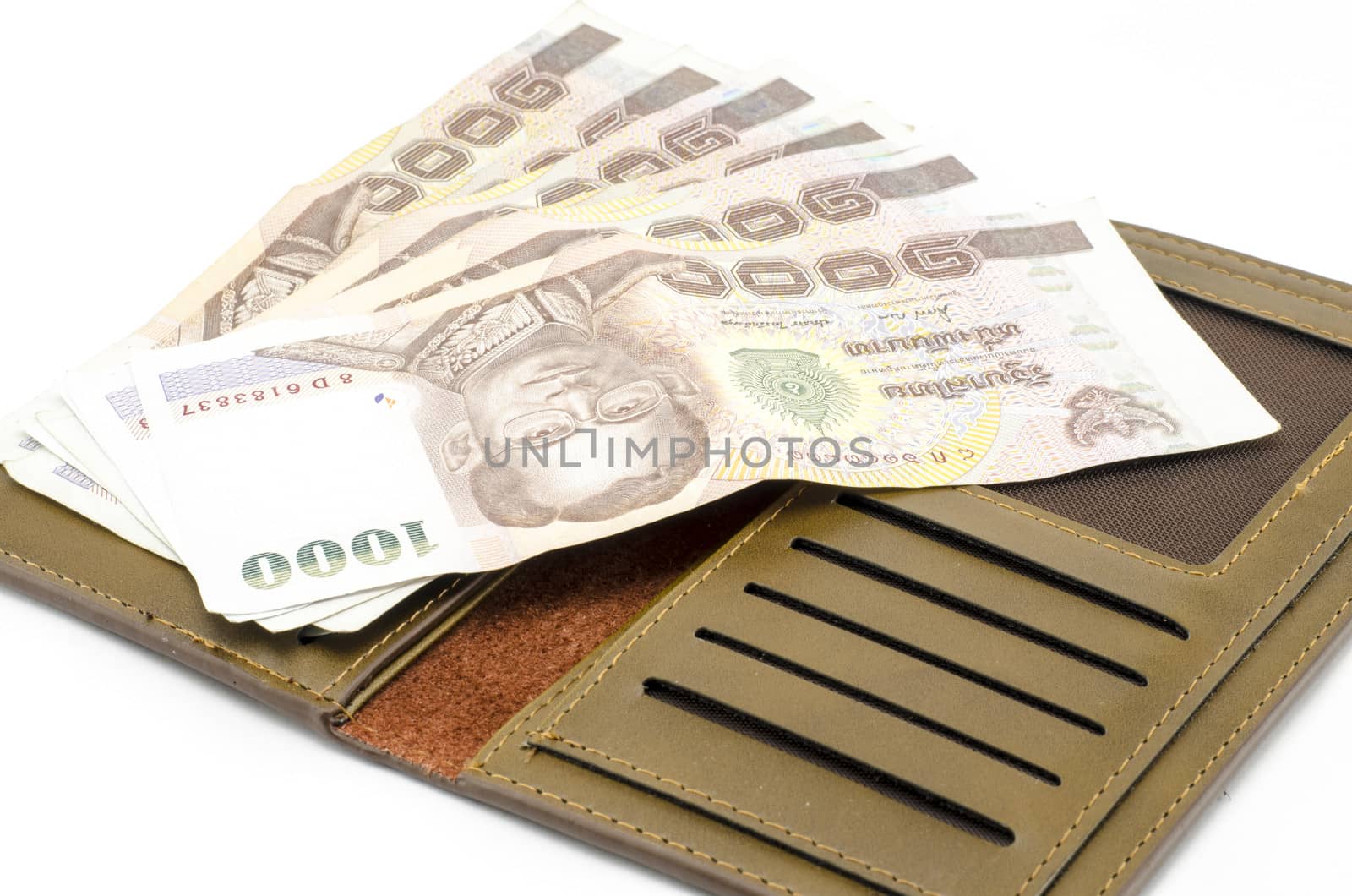 thai banknote in brown wallet by ammza12