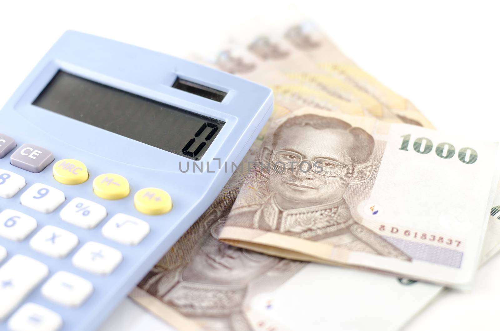 thai banknote with calculator isolated on white background