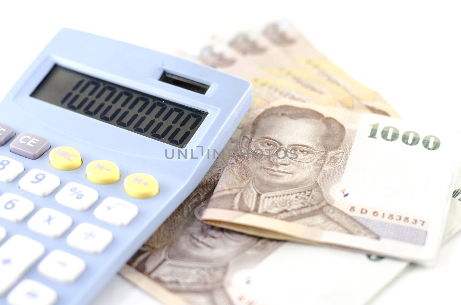 thai banknote with calculator isolated on white background