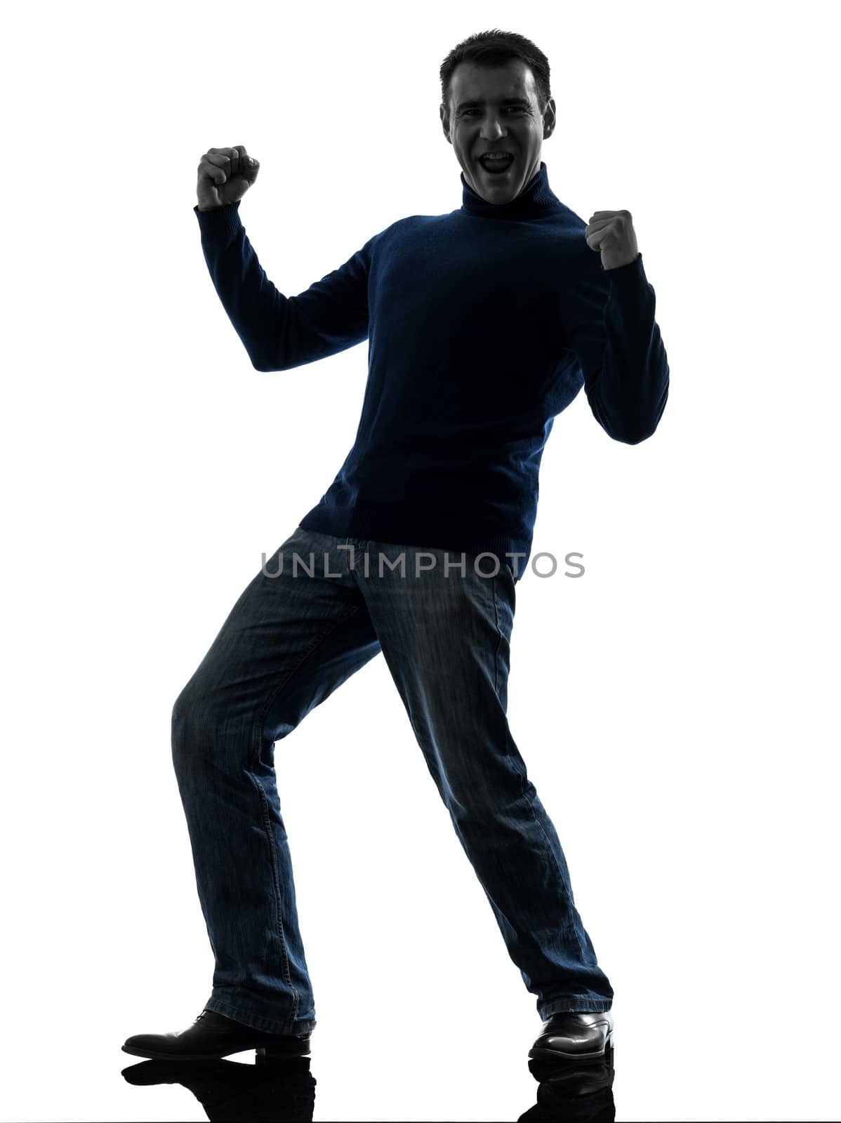 one caucasian man happy strong victorious full length in silhouette studio isolated on white background