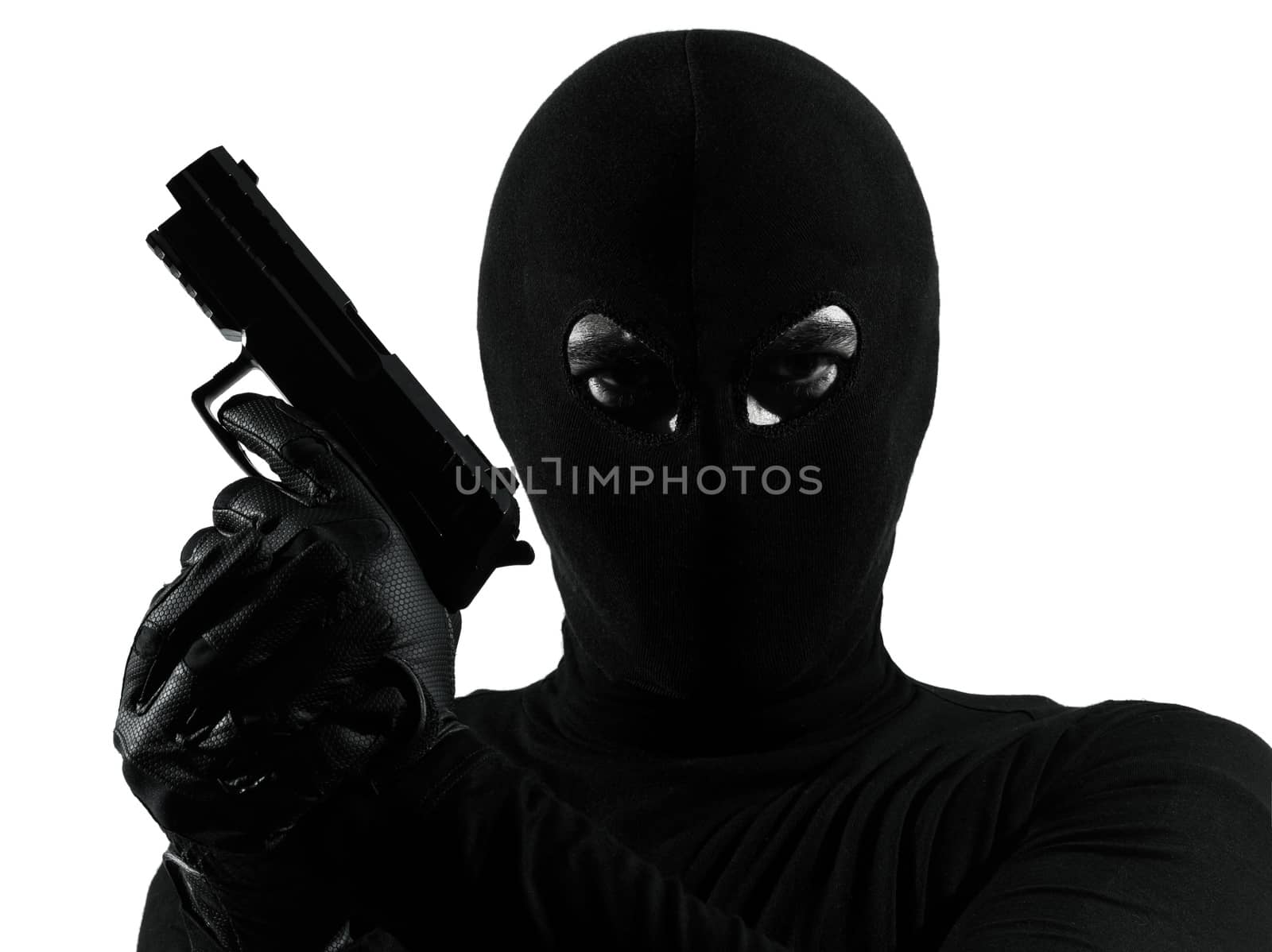 thief criminal terrorist holding gun portrait in silhouette studio isolated on white background