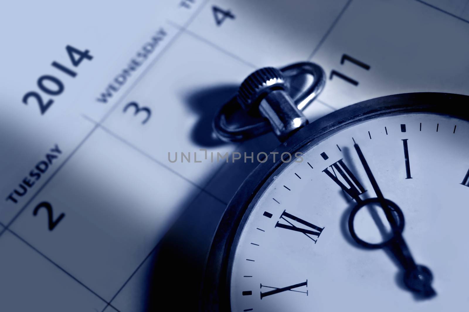 Vintage clock on a 2014 calendar