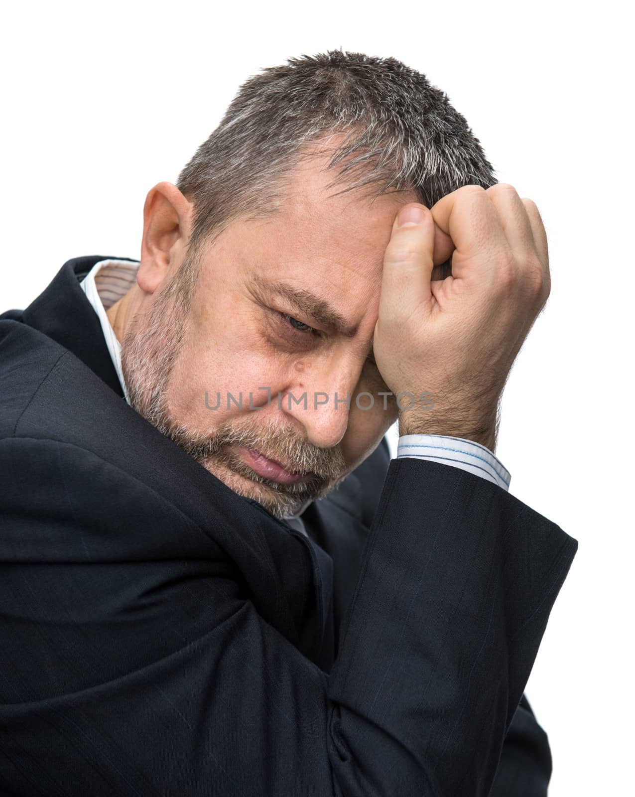 Headache. Portrait of an middle age man with face closed by hand. Isolated on white
