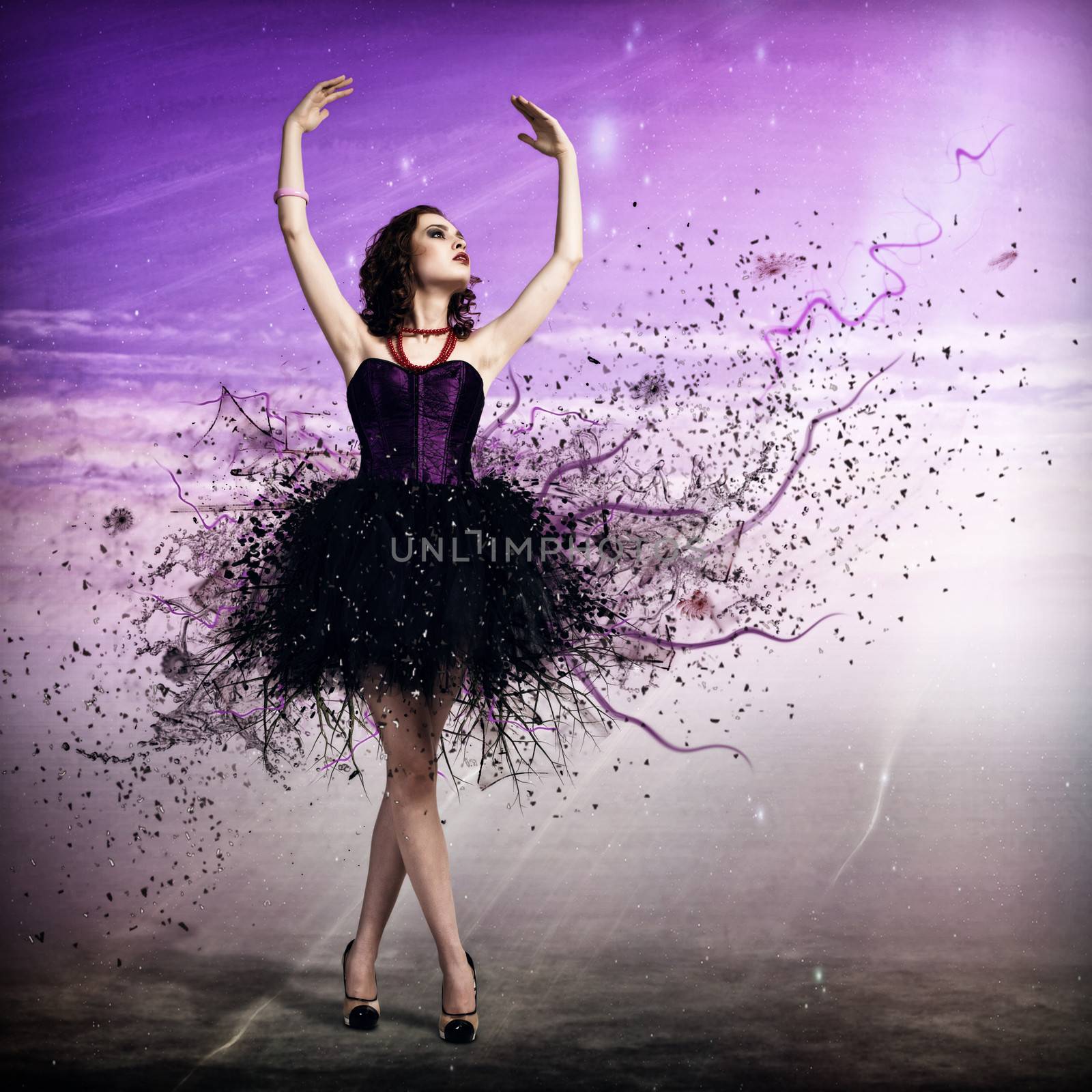 Young woman dancing for her abstract background