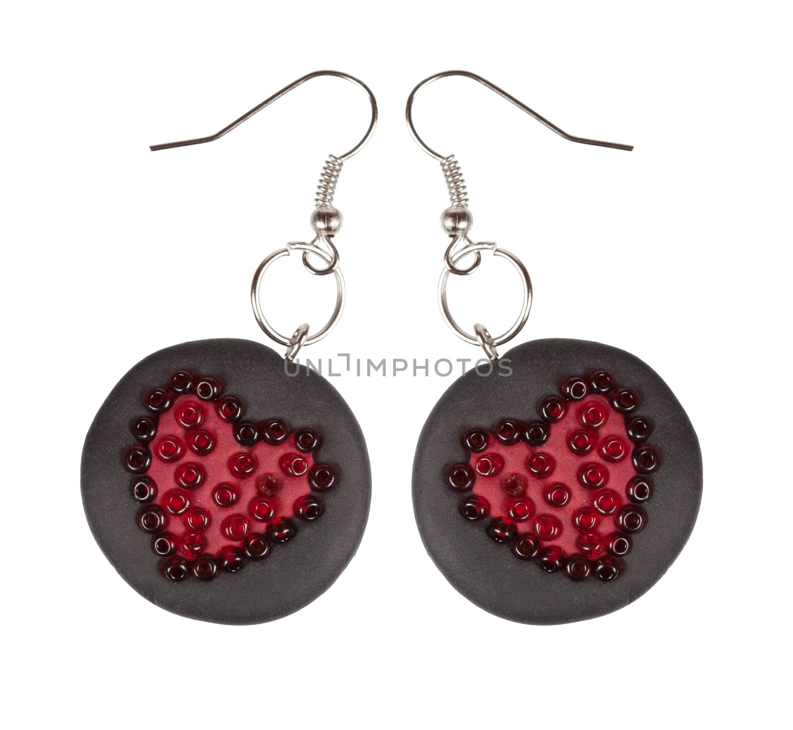 Heart earrings from polymer clay and beads. Gift for Valentine's Day. Isolated on a white background. Collage. 