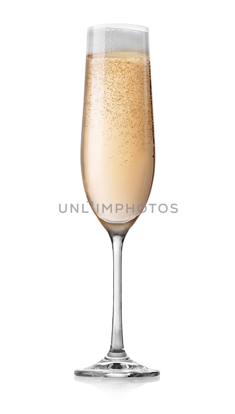 Champagne with bubbles in a glass isolated on white