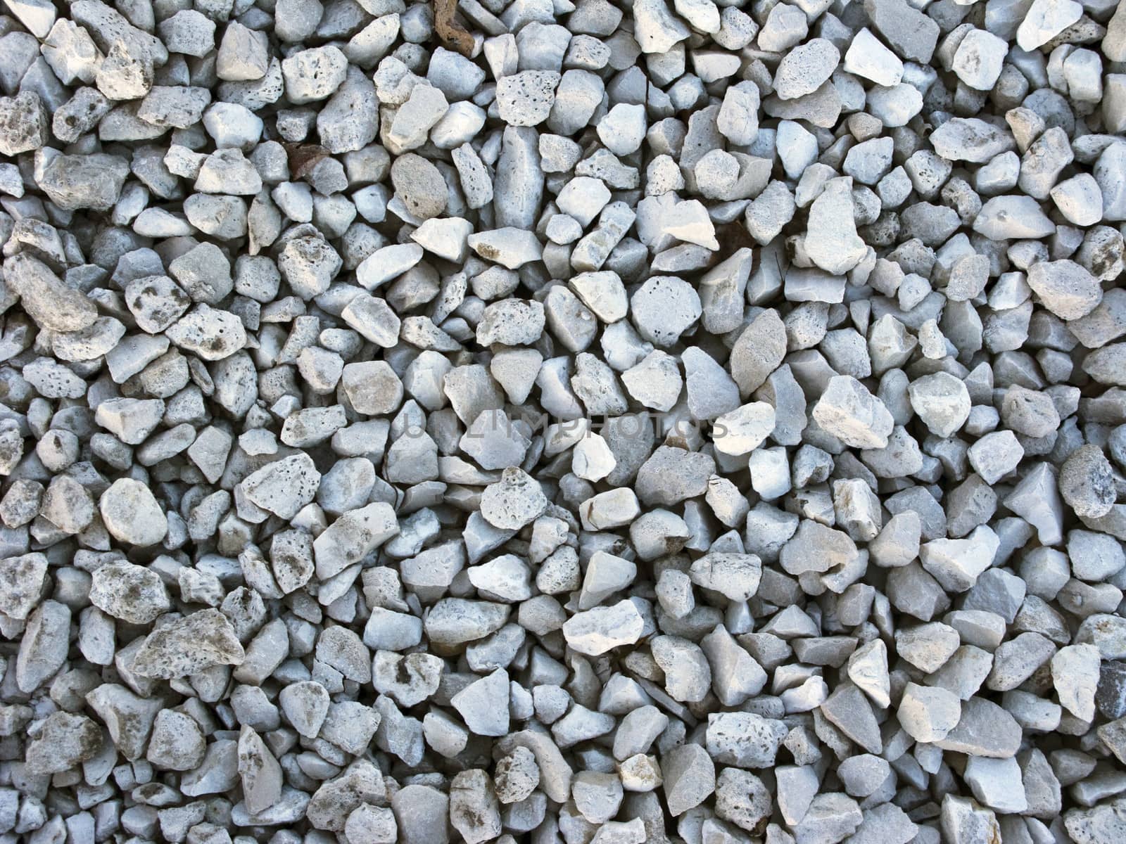 White crushed stone surface background texture