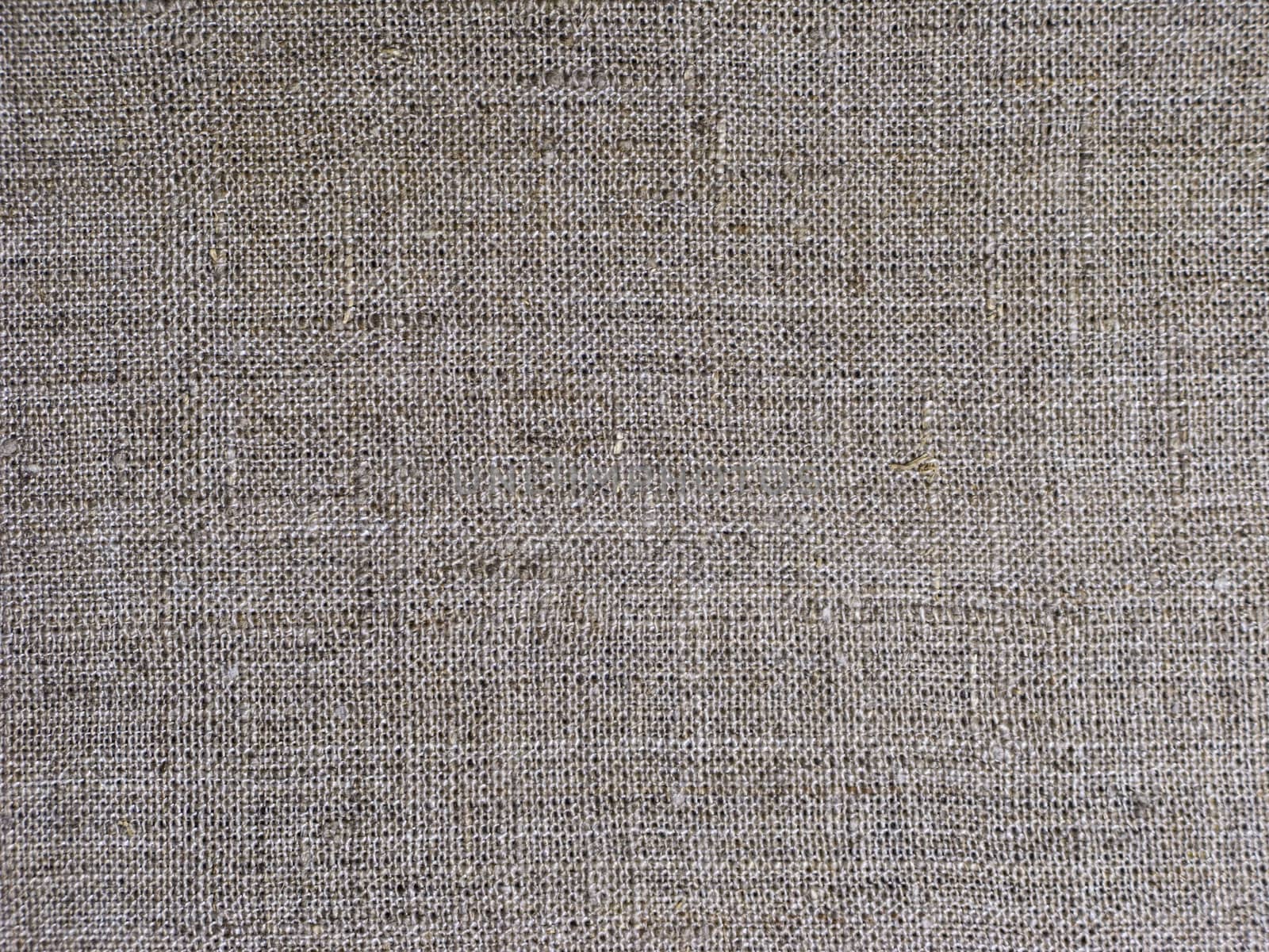 Fragment of gray rough flax fabric texture