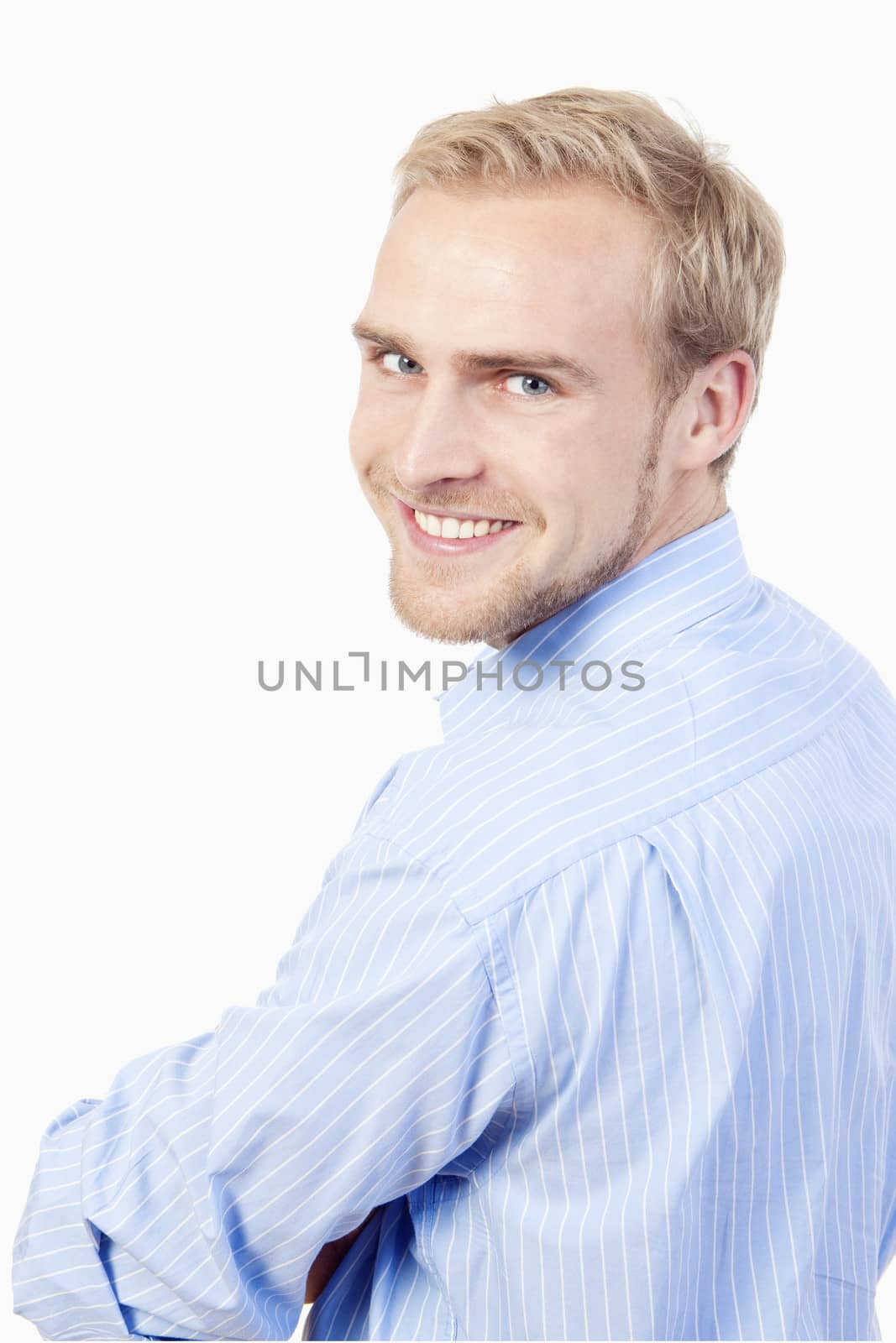 portrait of a young man with blond hair smiling - isolated on white