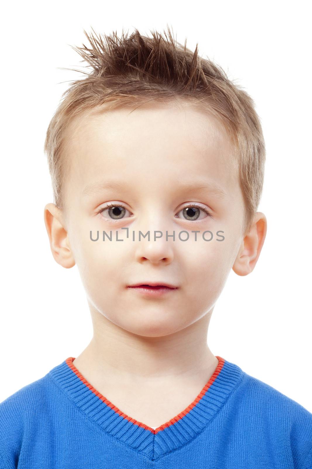 portrait of a boy with brown hair in blue top - isolated on white