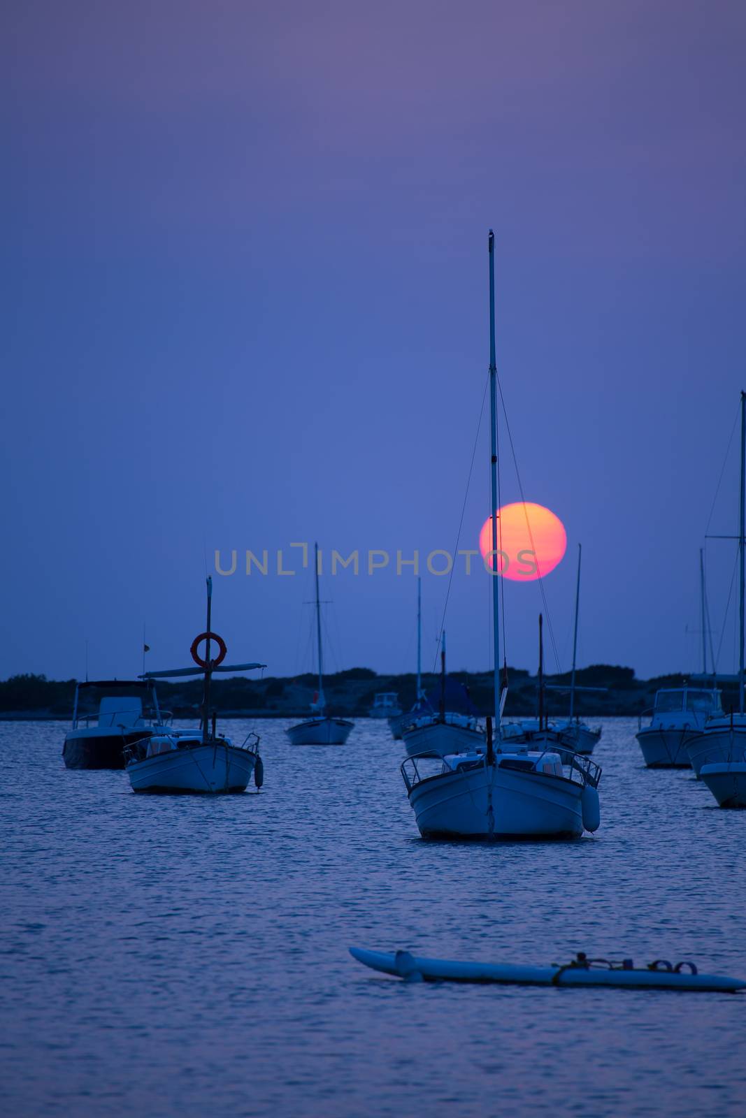 Formentera sunset at Estany des Peix lake in Balearic Islands